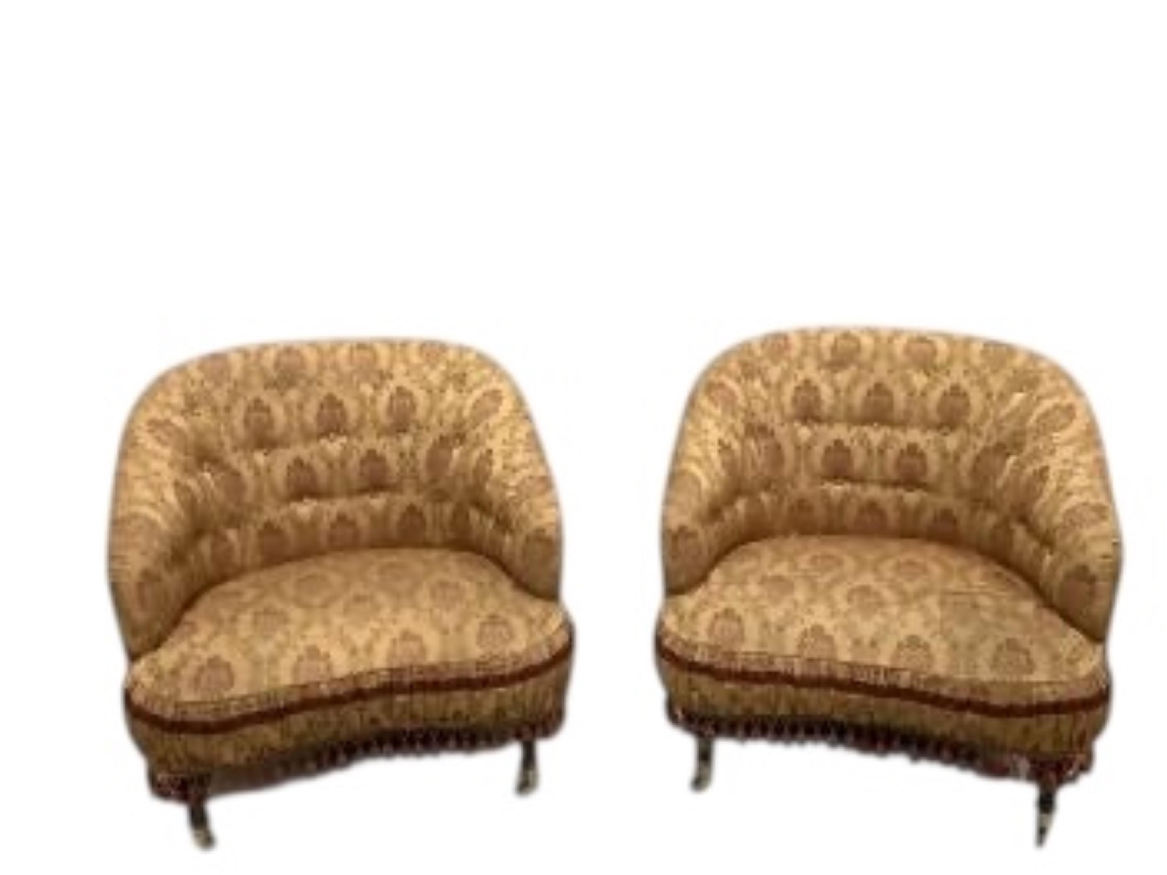 A pair of Provosi upholstered 'Tuffet' armchairs, width 94cm, depth 82cm, height 86cm